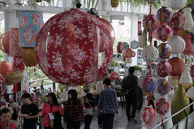 Visitors walk under lanterns during an exhibition by local artist Lin Chow-chin in Yilan, eastern Taiwan. u00e2u20acu201d AFP pic