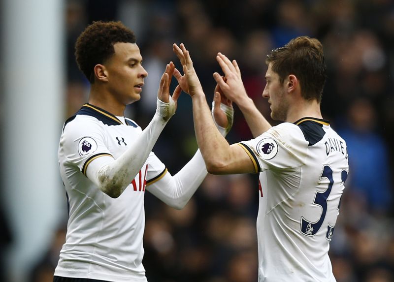 Tottenham's Dele Alli and Ben Davies celebrate at the end of the match against Stoke City. u00e2u20acu2022 Reuters pic