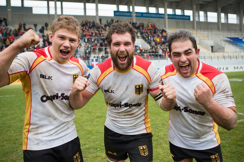 Germany's (from left) Eric Marks, Jarrid Els and Samy Fuechsel celebrate their shock victory in a Rugby Europe Championship match against Romania on February 11, 2017 in Offenbach. u00e2u20acu201d AFP pic