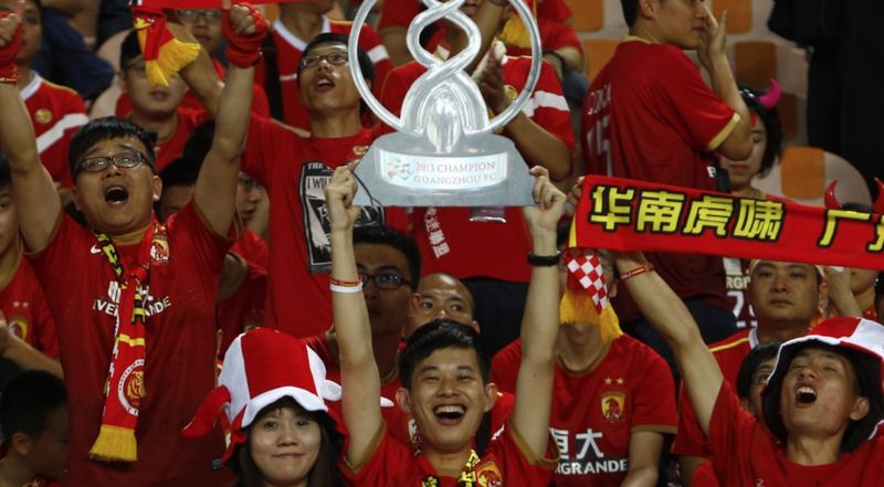Guangzhou Evergrande fans celebrate as their team wins the AFC Champions League in 2013 at the expense of FC Seoul. u00e2u20acu201d Reuters file pic