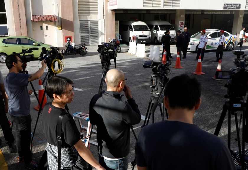 Cameramen stand outside the morgue at Putrajaya hospital on February 15, 2017. u00e2u20acu201d Reuters picnn