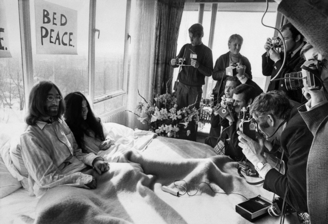 Beatles member John Lennon (L) and his wife Yoko Ono receiving journalists March 25, 1969 in the bedroom of the Hilton hotel in Amsterdam. u00e2u20acu201d  AFP pic