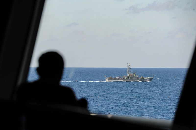 A Myanmar navy vessel escorting the Nautical Aliya ship that is heading to the Yangon port, in Myanmar waters in the Andaman Sea, February 7, 2017. u00e2u20acu201d Bernama pic