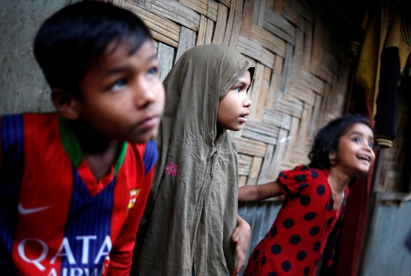 Rohingya refugee children look on at Leda Unregistered Refugee Camp in Teknaf, Bangladesh, February 15, 2017. u00e2u20acu201d Reuters pic 