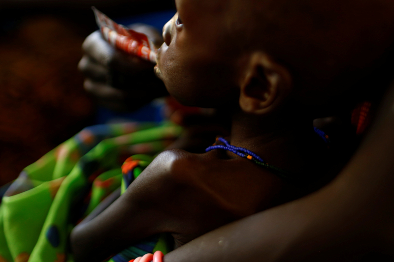 A mother feeds her child with a peanut-based paste for treatment of severe acute malnutrition in a Unicef supported hospital in Juba January 25, 2017. u00e2u20acu201d Reuters pic