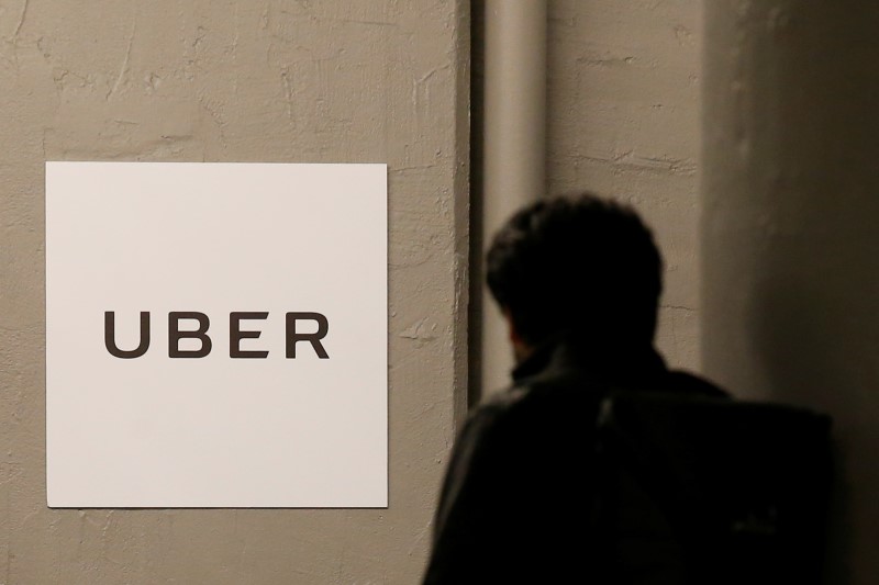 A man arrives at the Uber offices in Queens, New York, February 2, 2017. u00e2u20acu201d Reuters pic