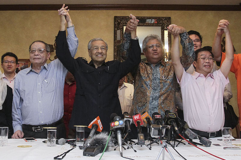 Datuk Zaid Ibrahim poses for photographers after officially announcing his membership with DAP in Petaling Jaya February 7, 2017. u00e2u20acu201d Picture by Yusof Mat Isa