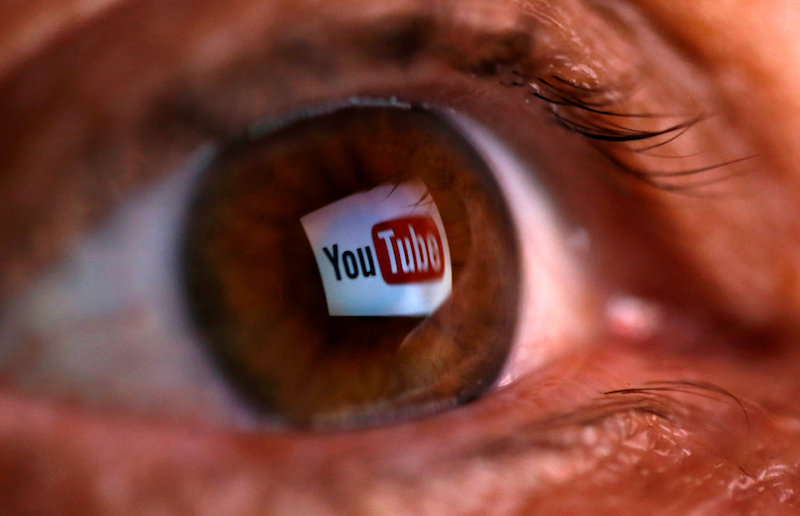 A picture illustration shows a YouTube logo reflected in a personu00e2u20acu2122s eye June 18, 2014. u00e2u20acu201d Reuters pic
