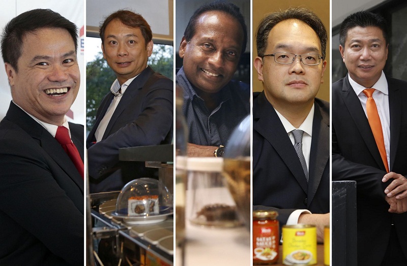 (from left) Jack Chua,ERA chief executive officer; Douglas Foo, Chairman, Sakae Holdings; Thomas Fernandez, founding chairman of PestBusters; Melvin Teo, Group Chief Executive Office, Yeo Hiap Seng Limited and Francis Koh, Managing Director and Group CEO,