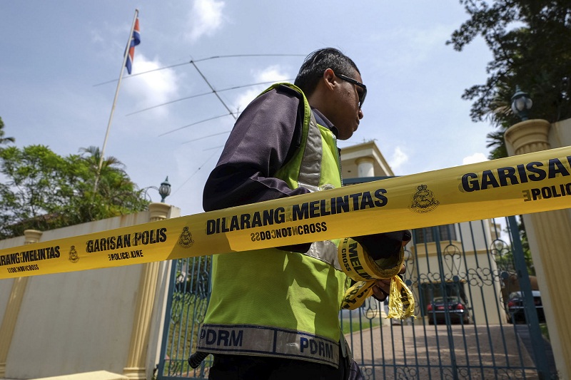 Malaysian police seal off access into and out of the North Korean embassy in Damansara Heights, Kuala Lumpur after the government imposed a ban on its diplomats from leaving the country on March 7, 2017. u00e2u20acu201d Picture by Yusof Mat Isa