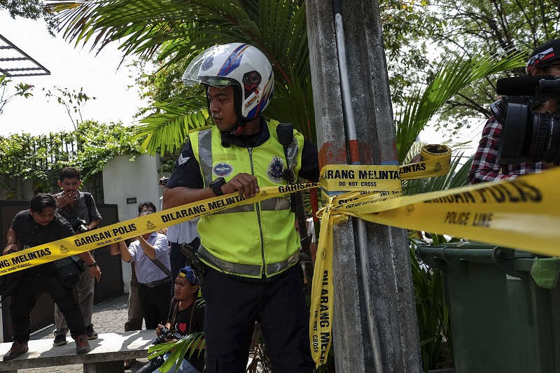 Malaysian police seal off access into and out of the North Korean embassy in Damansara Heights, Kuala Lumpur after the government imposed a ban on its diplomats from leaving the country on March 7, 2017.