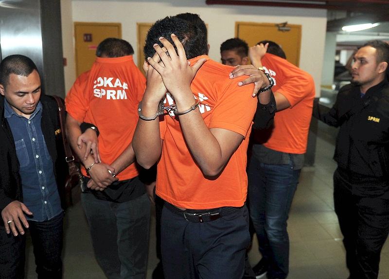 Four men, including Johor exco Datuk Abd Latif Bandiu00e2u20acu2122s son, are released on MACC bail in Johor Baru March 9, 2017. u00e2u20acu201d Bernama pic