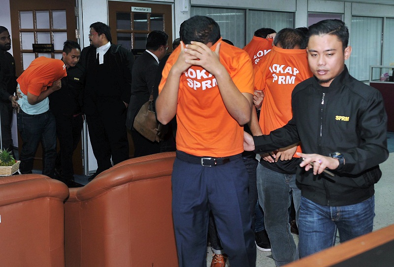 Four men, including Johor exco Datuk Abd Latif Bandiu00e2u20acu2122s son, are released on MACC bail in Johor Baru March 9, 2017. u00e2u20acu201d Bernama pic