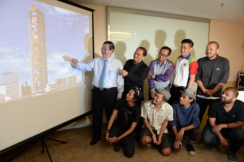 Penang Chief Minister Lim Guan Eng showing an artistu00e2u20acu2122s impression of the mural at the announcement of the u00e2u20acu02dcworldu00e2u20acu2122s tallest muralu00e2u20acu2122 project at Komtar, George Town March 9, 2017. u00e2u20acu201d Picture by K.E.Ooinn