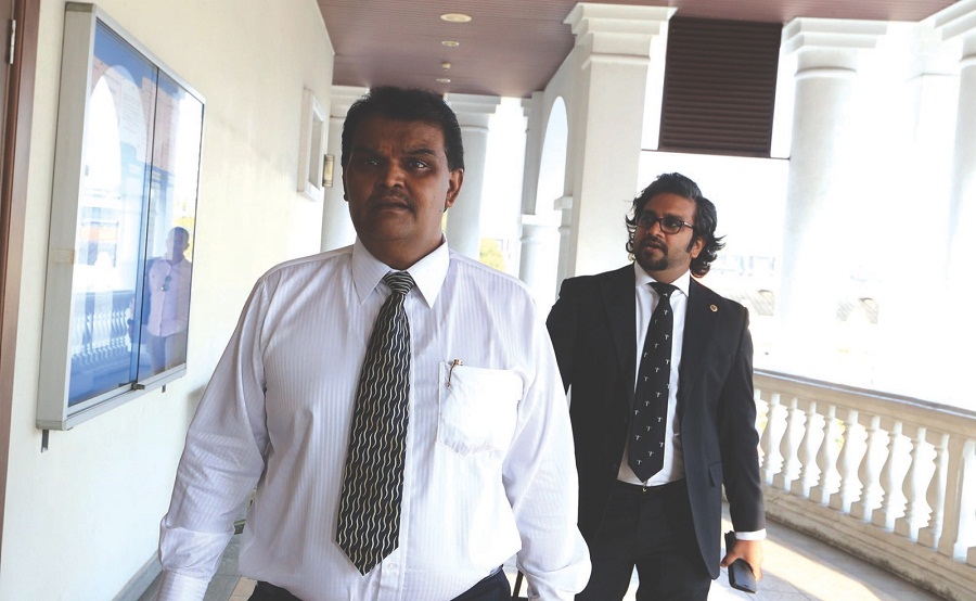 Businessman Datuk N. Vasantharajan (left) with his counsel Dave Kumarendran. u00e2u20acu201d Picture by  Sayuti Zainuddin 