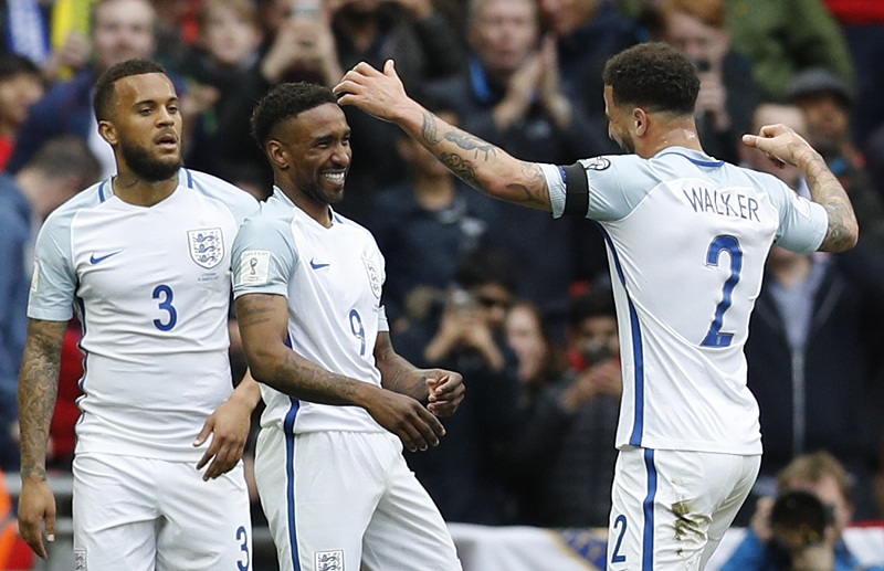 Englandu00e2u20acu2122s Jermain Defoe celebrates with Kyle Walker and Ryan Bertrand after scoring their first goal during the 2018 World Cup Qualifying European Zone match against Lithuania at the Wembley Stadium London March 26, 2017. u00e2u20acu201d Reuters pic