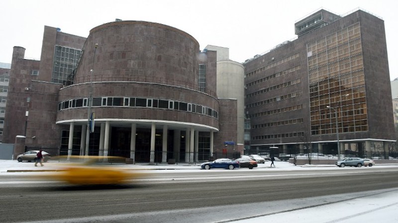 A picture taken on February 13, 2017 shows cars passing by the Tsentrosoyuz building in Moscow, the office block designed by Swiss-French architect Le Corbusier and completed in 1936 to house the Soviet Union's ministry of light industry.u00c2u00a0u00e2u20acu201d AFP pic