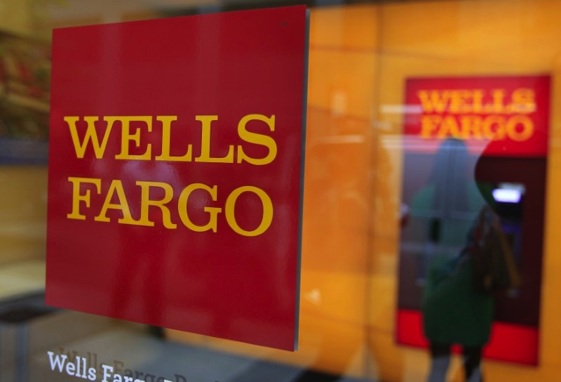 A Wells Fargo sign is seen outside a banking branch in New York July 13, 2012. u00e2u20acu201d Reuters pic