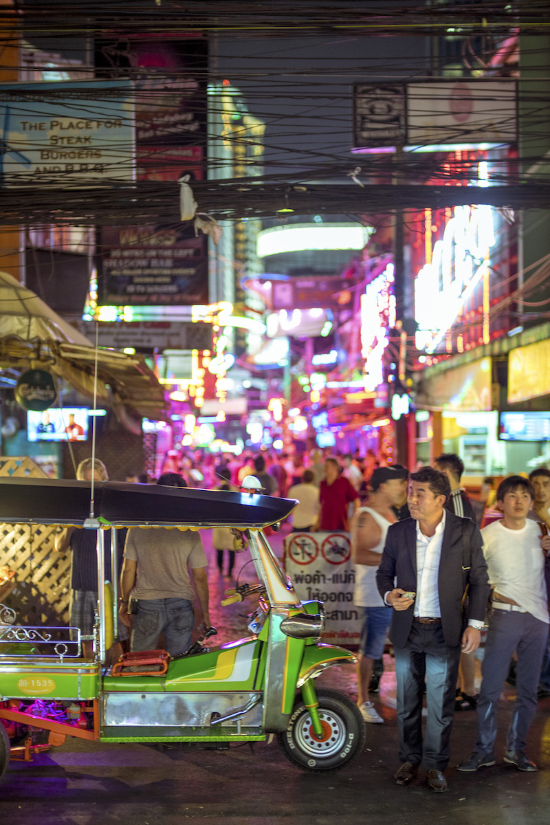 A tuk-tuk awaits passengers on a busy street in Bangkok February 24, 2017. Bangkok offers a vibrant nightlife scene that comes alive on the street after the sun sets and mobile bars materialize. — Picture by David Terrazas/The New York Times