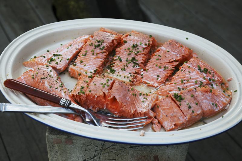 Baked salmon, prepared for lunch, at the home of Paula Wolfert in Sonoma, California. ― Picture by Jim Wilson/The New York Times