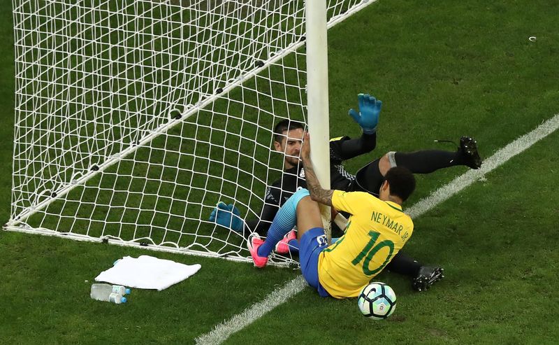 Paraguayu00e2u20acu2122s goalkeeper Antony Silva tries to stop Brazilu00e2u20acu2122s Neymar (10) during their World Cup 2018 Qualifiers at the Arena Corinthians stadium, Sao Paulo, Brazil March 28, 2017. u00e2u20acu201d Reuters pic