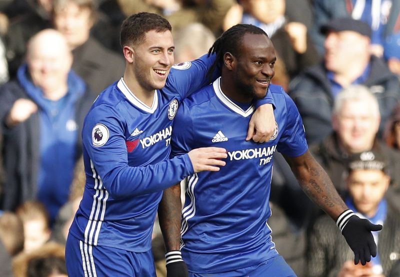 Chelseau00e2u20acu2122s Eden Hazard celebrates scoring their second goal with Victor Moses during their Premier League match against Arsenal at Stamford Bridge, February 4, 2017. u00e2u20acu201d Reuters pic