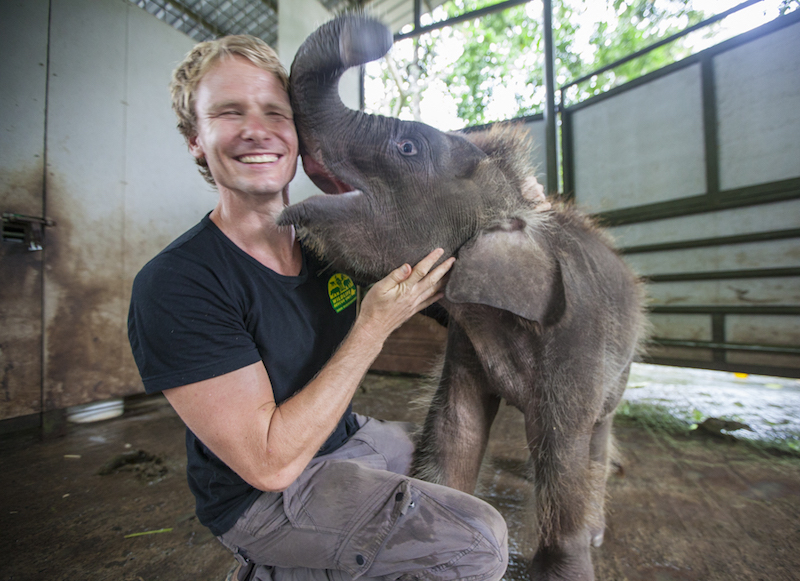 Aaron u00e2u20acu02dcBertieu00e2u20acu2122 Gekoski gets to get up close and personal with Jo, a baby Borneo elephant. u00e2u20acu201d Photo courtesy of Scubazoo