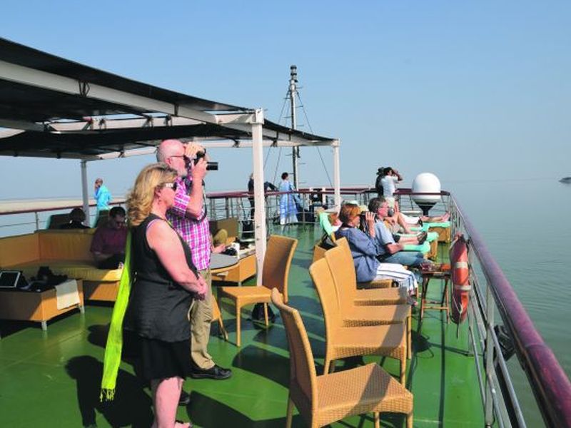 Taking in the views from the upper deck of the cruise ship, the MV Mahabaahu. 