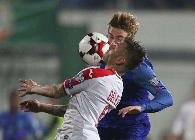 Bulgaria's Spas Delev (right) and Netherland's Mathijs De Ligt in European World Cup qualifying action in Sofia March 25, 2017. u00e2u20acu201d Reuters pic