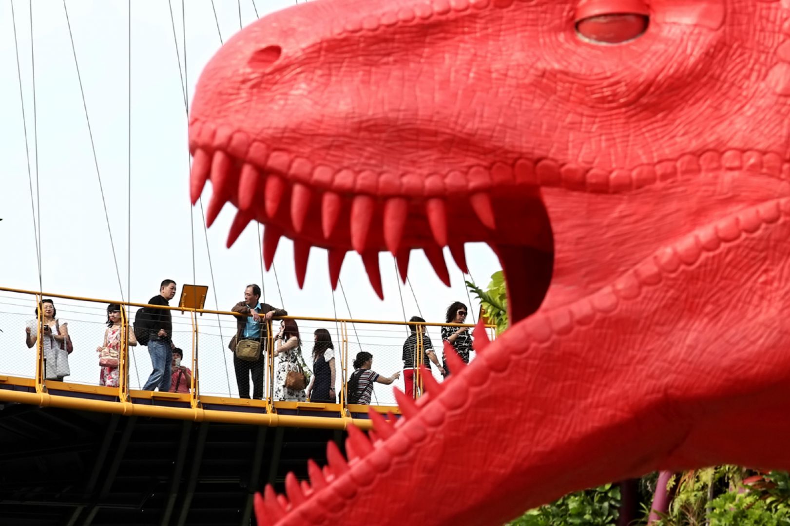 11 multi-coloured life-sized dinosaurs sculptures have been installed in Gardens by the bay, as part of the Children's Festival which begins on March 10. u00e2u20acu201d TODAY pic