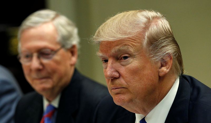 Senate Majority Leader Mitch McConnell (left) sits beside US President Donald Trump during a leadership lunch at the White House in Washington March 1, 2017. u00e2u20acu201d Reuters pic