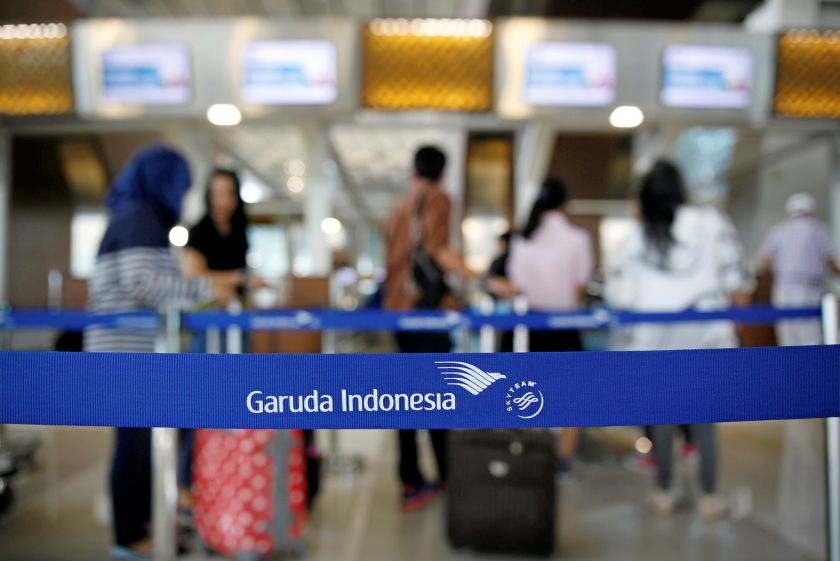Travellers line up at Garuda's check in counter at the Soekarno-Hatta Airport in Jakarta in this picture released March 6, 2017. u00e2u20acu201d Reuters pic
