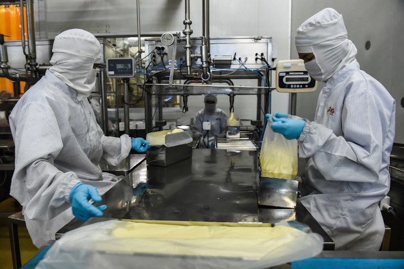 Employees package butter at a halal dairy and biscuit factory in Bangkok January 31, 2017. u00e2u20acu201d AFP pic