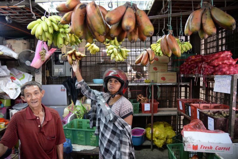 A fruit and vegetable stall in the market.
