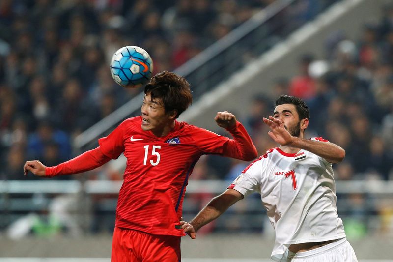 South Koreau00e2u20acu2122s Hong Jeong-ho and Syriau00e2u20acu2122s Kharbin Omar in action during their World Cup 2018 qualifiers match in Seoul, March 28, 2017. u00e2u20acu201d Reuters pic