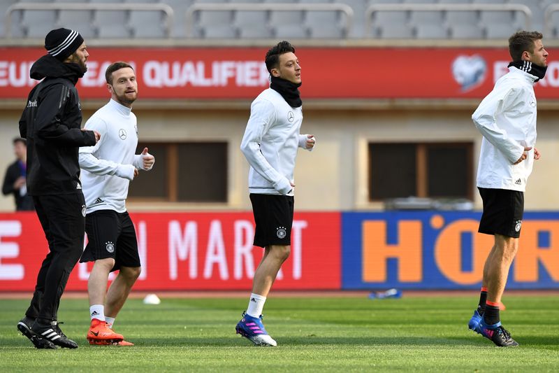 Germanyu00e2u20acu2122s Shkodran Mustafi, Mesut Ozil and Thomas Mueller take part in a training session in Baku on March 25, 2017 on the eve of the FIFA World Cup 2018 qualification football match between Azerbaijan and Germany. u00e2u20acu201d AFP pic