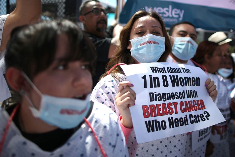 People march in a 'Save Obamacare' rally on the seventh anniversary of Obamacare's signing, in Los Angeles,  March 23, 2017. u00e2u20acu201d Reuters pic