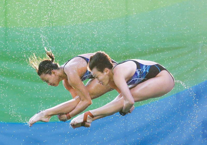 Pandelela (left) and Jun Hoong lived up to their potential to win a silver in Beijing. u00e2u20acu201d File pic