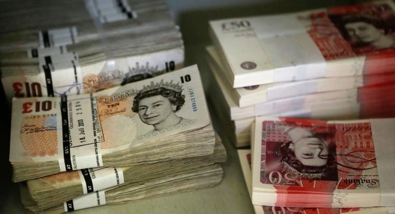 Wads of British Pound Sterling banknotes are stacked in piles at the GSA Austria (Money Service Austria) company's headquarters in Vienna July 22, 2013. u00e2u20acu201d Reuters pic