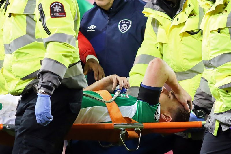 Republic of Irelandu00e2u20acu2122s defender Seamus Coleman is taken from the pitch after being injured during the World Cup 2018 qualification football match between Republic of Ireland and Wales at Aviva Stadium in Dublin, Ireland, March 24, 2017. u00e2u20acu201d AFP pic