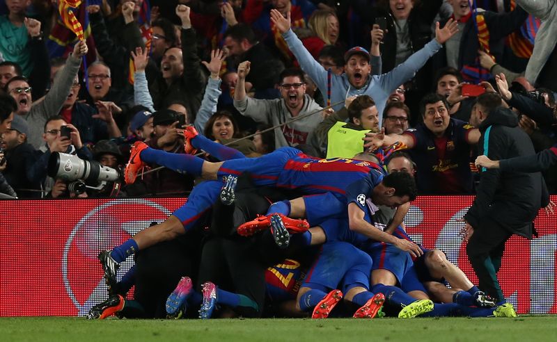 Barcelona's Sergi Roberto celebrates scoring their sixth goal with team mates in the Champions League match against PSG in Barcelona March 8, 2017. u00e2u20acu201d Reuters pic