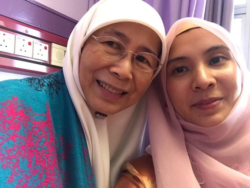 nPKR president Datuk Seri Dr Wan Azizah Wan Ismail and her daughter Nurul Izzah Anwar are pictured at an undisclosed hospital. u00e2u20acu201d Picture courtesy of Nurul Izzah Anwarn