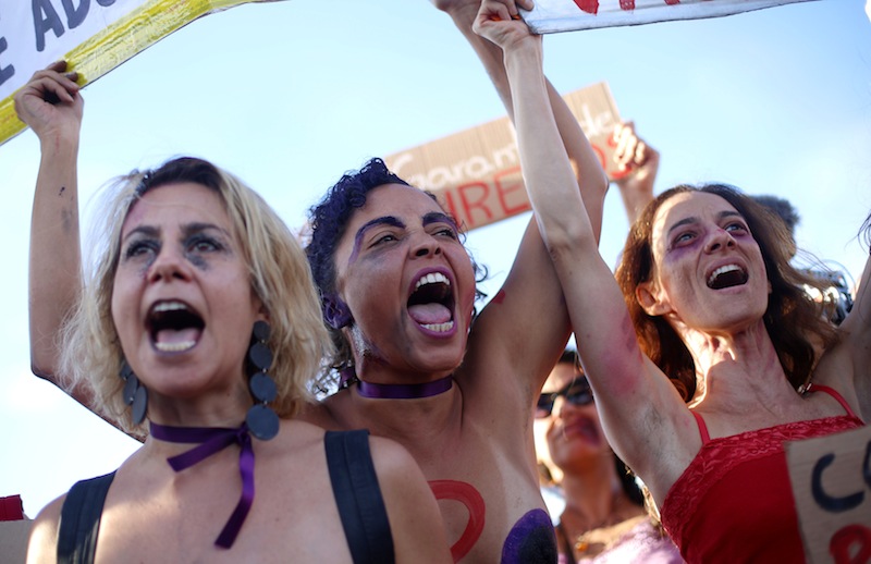 Demonstrators take part in a march on International Women's Day in Brasilia, Brazil, March 8, 2017. u00e2u20acu201d Reuters pic