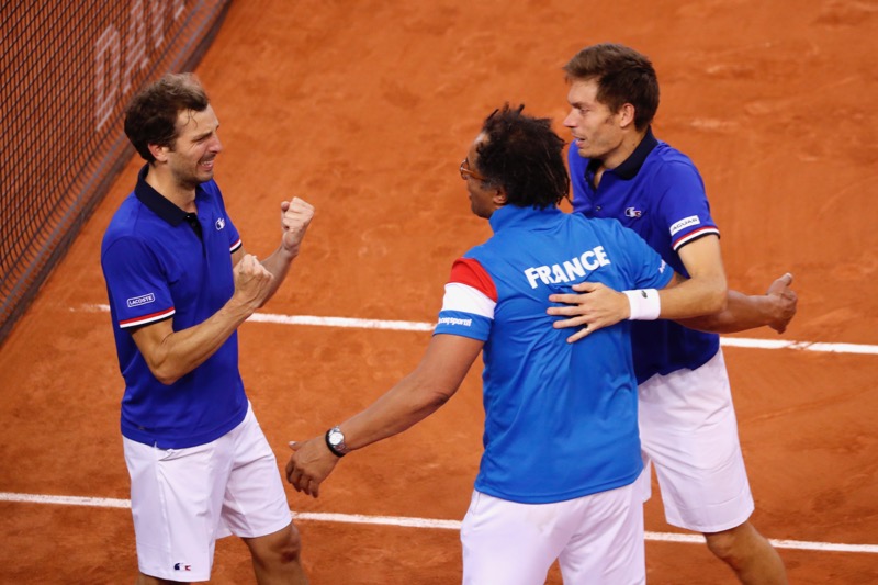 Franceu00e2u20acu2122s Julien Benneteau and Nicolas Mahut celebrate winning their Davis Cup Quarter Final match, with their captain Yannick Noah, against Great Britainu00e2u20acu2122s Dominic Inglot and Jamie Murray in Kindarena, Rouen, France, August 9, 2017. u00e2u20acu201d Reuters/Gonzal
