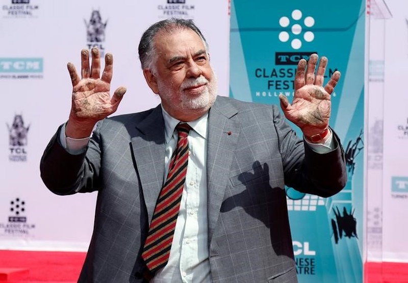 Director Francis Ford Coppola shows his hands after placing his handprints in cement during a ceremony in the forecourt of the TCL Chinese theatre in Los Angeles April 29, 2016. u00e2u20acu201d Reuters pic