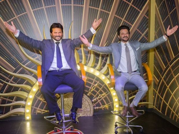 Anil Kapoor strikes a pose beside  his new Madame Tussauds wax figure. u00e2u20acu201d Picture courtesy of Madame Tussauds Singapore