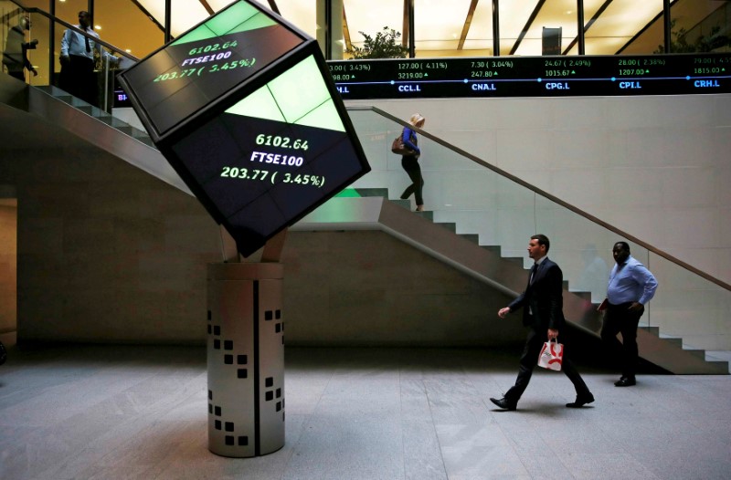 People walk through the lobby of the London Stock Exchange in London August 25, 2015. u00e2u20acu201d Reuters pic