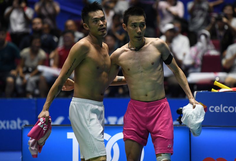 Lin Dan of China (left) embraces opponent Lee Chong Wei of Malaysia after his victory in their men's singles final match at the Malaysia Open Badminton Superseries in Kuching on April 9, 2017. u00e2u20acu201d AFP picnnn
