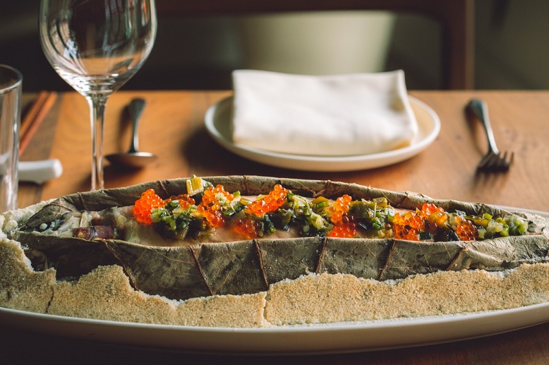 The salt-baked trout at Mister Jiuu00e2u20acu2122s, where flavours and traditions are combined, in San Francisco, April 5, 2017. u00e2u20acu201d Picture by Pete Lee/Mister Jiuu00e2u20acu2122s via The New York Times 