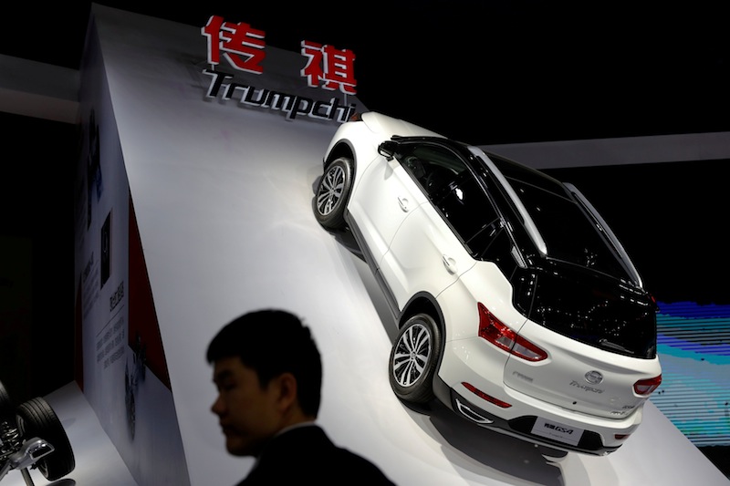 A man stands in front of Trumpchi GS4 from GAC Group displayed at the Shanghai Auto Show, in Shanghai, China April 20, 2017. u00e2u20acu201d Reuters pic